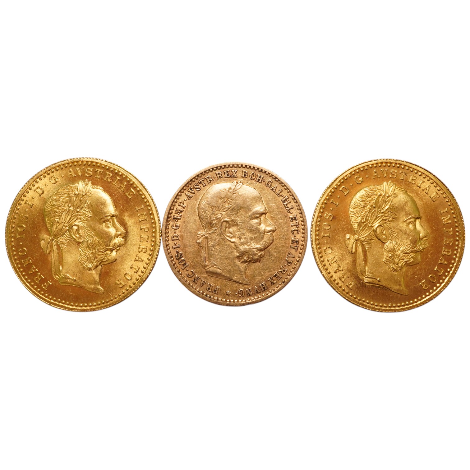 Austrian Empire gold coins, Francis Joseph I, two individual gold 1 ducat, 1915 re-strikes, UNC and a gold 10 corona, 1897, good VF (3)